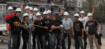 Students from the Faculty of Applied Science help build a house for Habitat for Humanity.